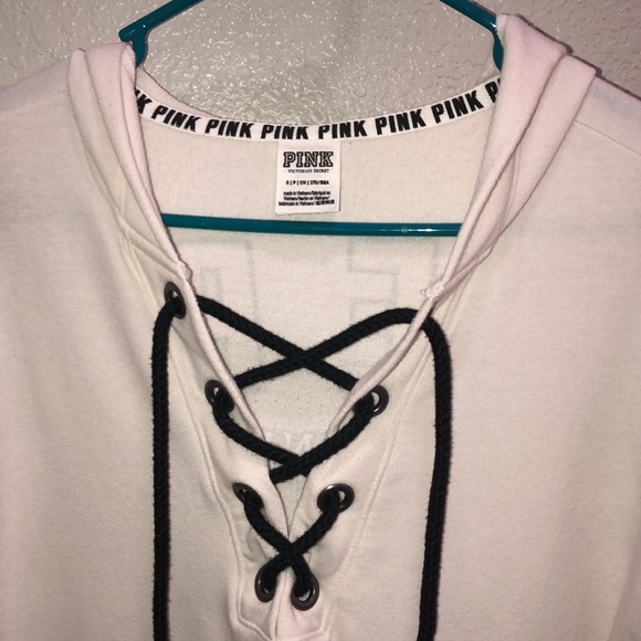 A cute white “pink” top with open front. - Picture 4 of 5